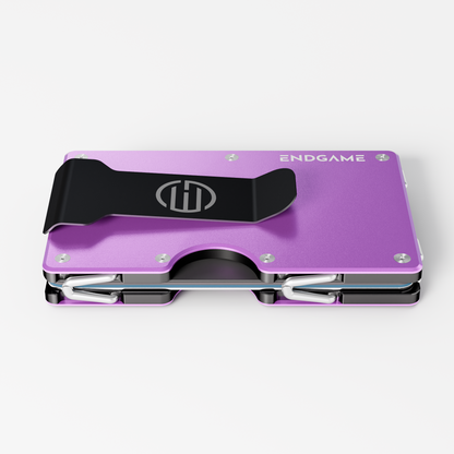Back of an Endgame Carry aluminum wallet in Viola Zefiro purple, showing the stainless steel money clip and cards held between the plates