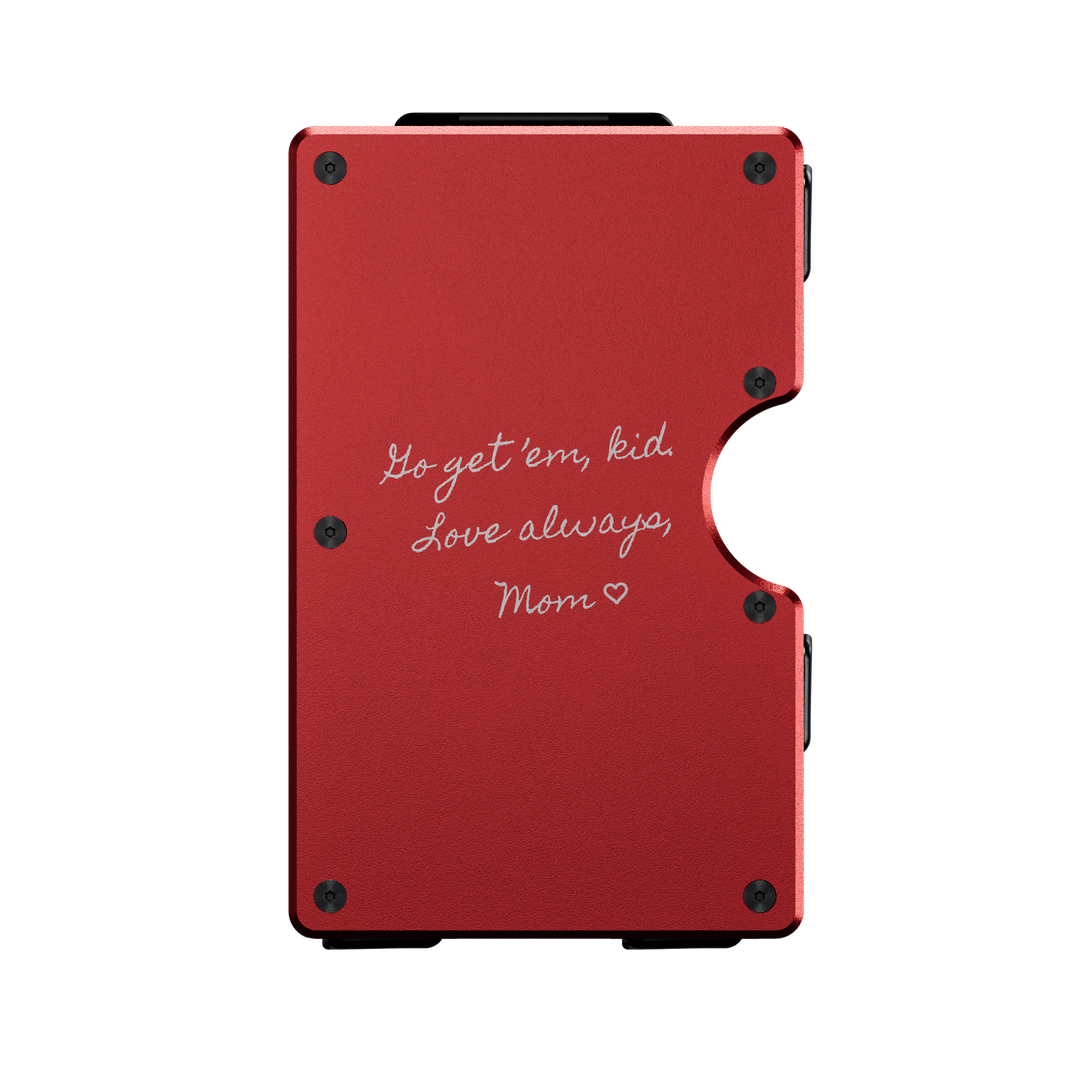 Project 1-of-1 personalized metal wallet in Rosso Apice red, laser-engraved with a handwritten note (example design)