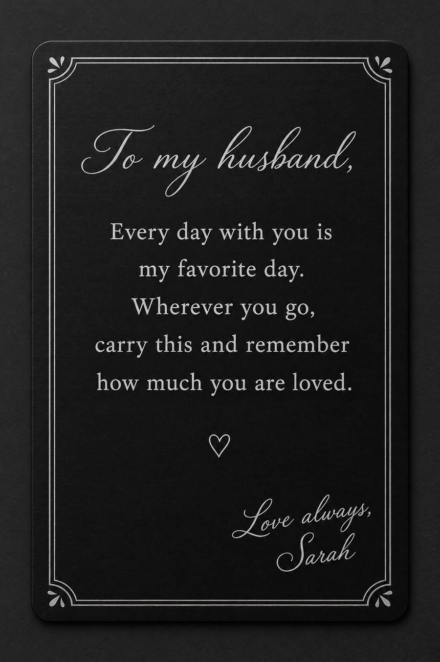 Letter: a love note to my husband engraved on a black aluminum wallet card