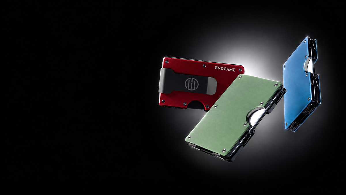 Three Endgame Carry aluminum wallets with steel hinges, in red, green and blue